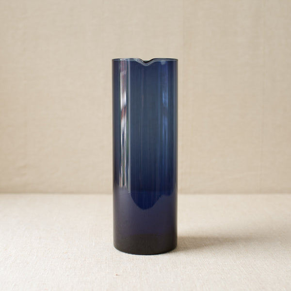 Rare Kaj Franck glass pitcher from 1954, showcasing a simple cylindrical form. A true collectible and iconic piece of mid-century Scandinavian design.