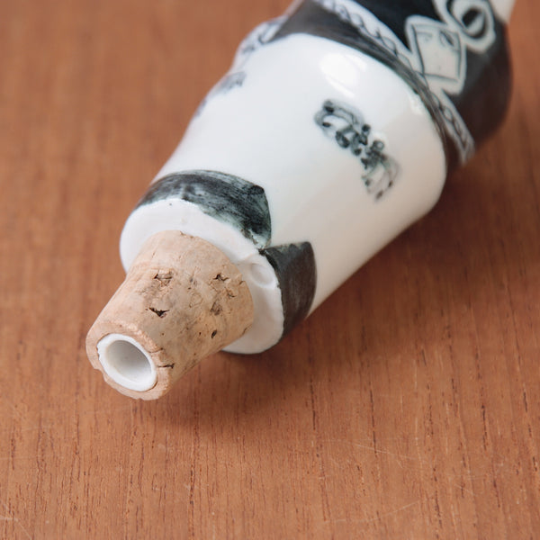 This British grenadier guard bottle stopper from the 1950s showcases the influence of post-war British art in its ceramic design.