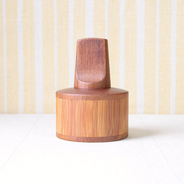 Rare Danish Quistgaard model 1525 pepper mill, crafted from teak and bamboo, embodying mid-century Scandinavian design.
