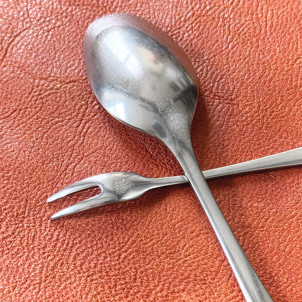 Reverse side of Dansk cutlery showing makers mark. Collectible Danish Designs Variations V flatware by Jens Quistgaard, an 80-piece set from Dansk with mid-century modern and Scandinavian appeal, for sale at Art & Utility.