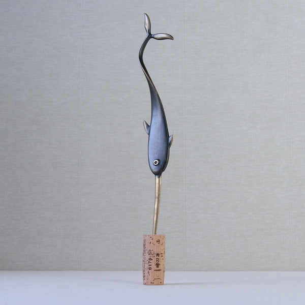 Minimalist brass narwhal letter opener by Richard Rohac, available in London, UK. A sleek, vintage piece embodying midcentury design principles. Museum quality collectible.
