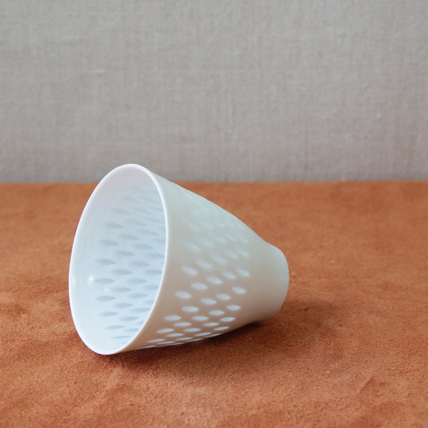 Scandinavian design small porcelain vase with a rice grain pattern by Friedl Holzer-Kjellberg, showcasing elegant midcentury aesthetics. For sale at Art & Utility, London.