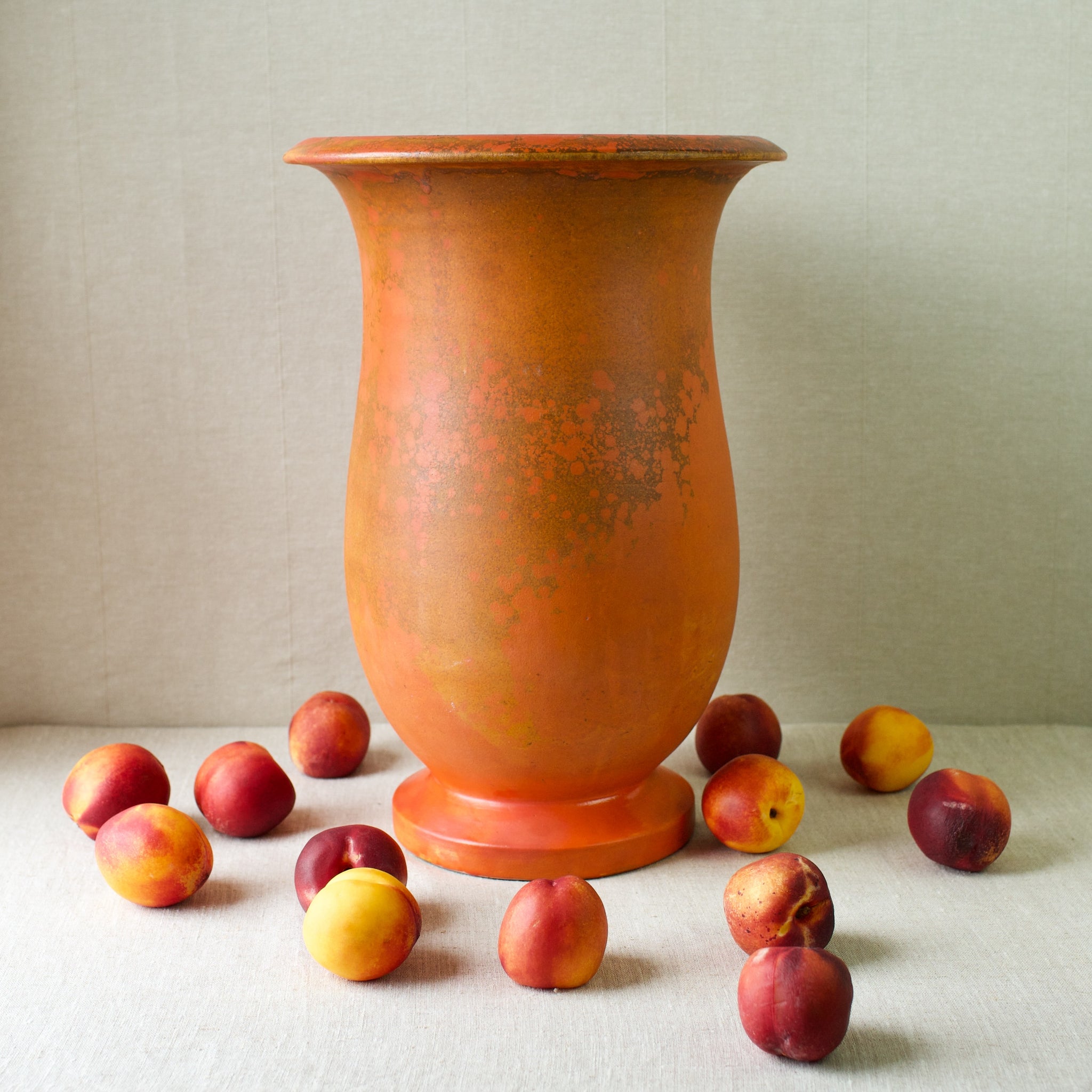 Still life with fruit of a a stunning Danish modern uranium-glazed floor vase from Kähler Pottery, circa 1920.