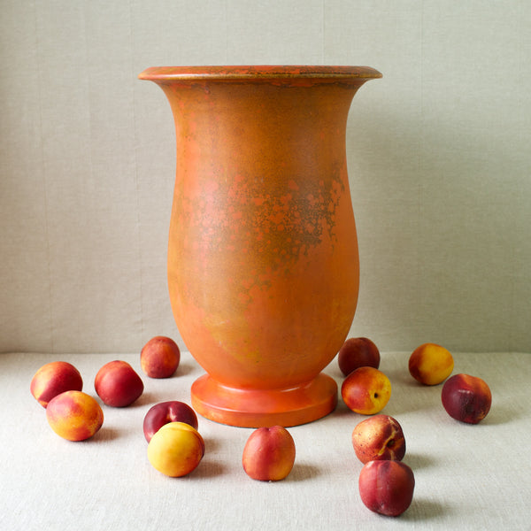 Still life with fruit of a a stunning Danish modern uranium-glazed floor vase from Kähler Pottery, circa 1920.