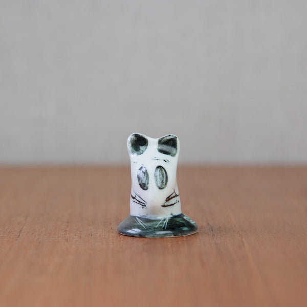 Ceramic mouse sculpture by Susan Parkinson from the 1950s, with large round ears and monochromatic brushstrokes.