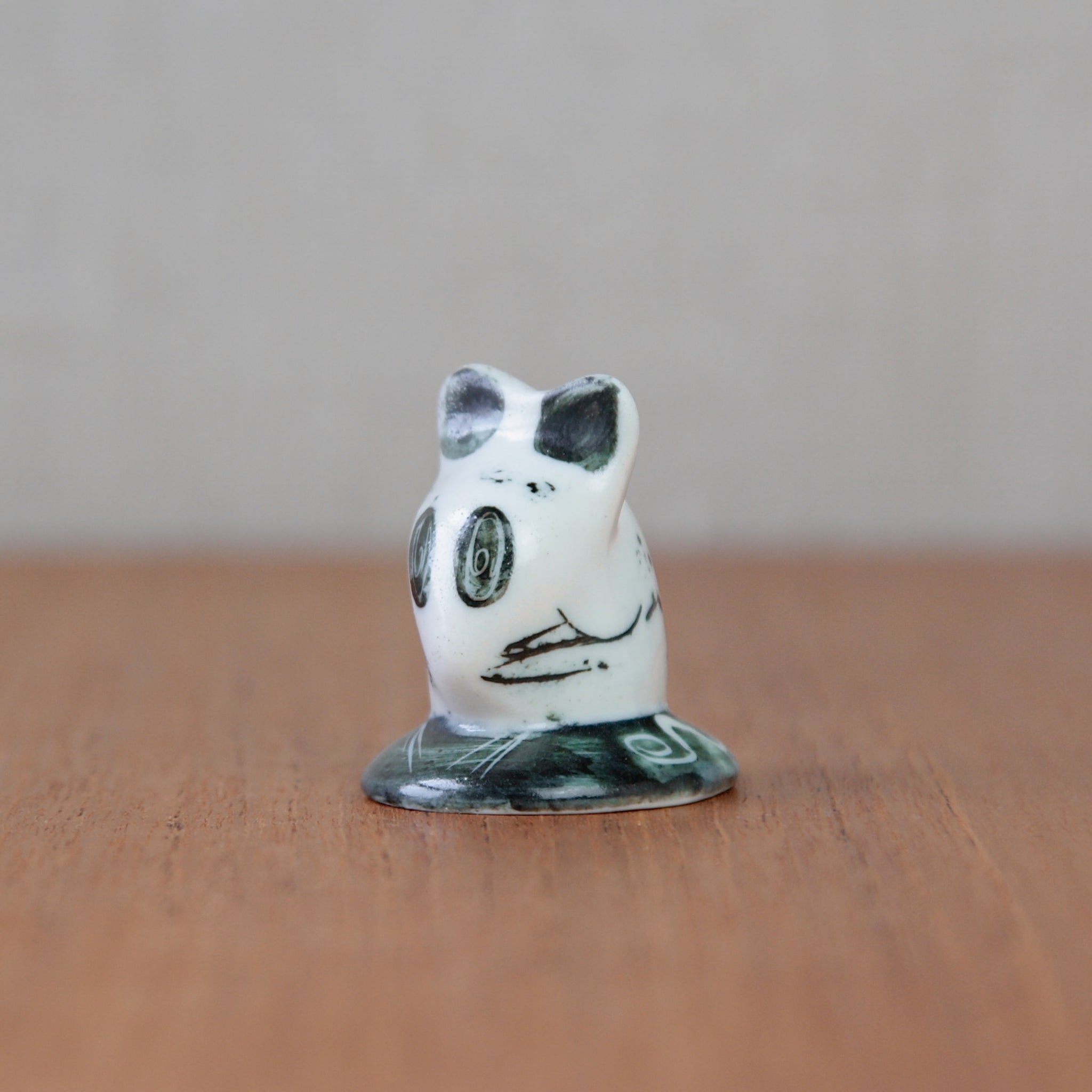 Susan Parkinson's 1956 mouse figurine, Model No. 71, features signature design elements and detailed craftsmanship in ceramic.