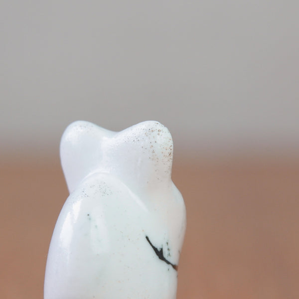 White ceramic mouse figurine by Susan Parkinson from 1956 with monochrome brushstroke design and distinct features.