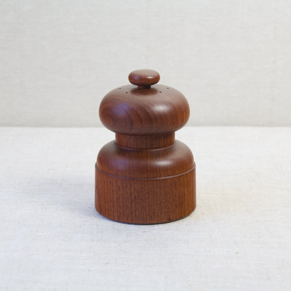 An image looking down onto a Model 1616 "Mushroom" Peppermill and Saltshaker designed by Scandinavian sculptor Jens Quistgaard. Art & Utility offer worldwide shipping to places including Singapore, Japan, Hong Kong and Taiwan.