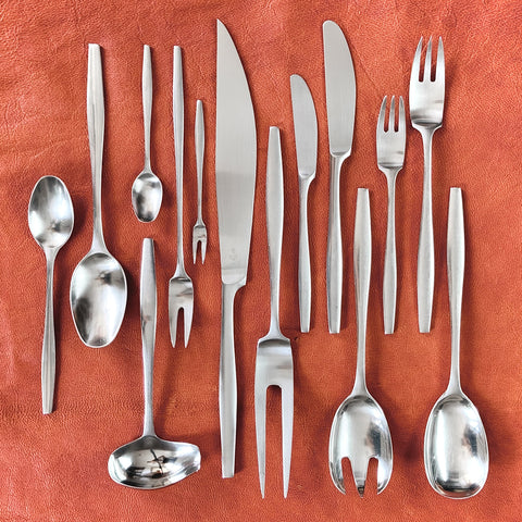 Large Jens Quistgaard Variations V stainless steel cutlery set, a rare 80-piece collection by Dansk Designs, perfect for vintage enthusiasts, for sale at Art & Utility.