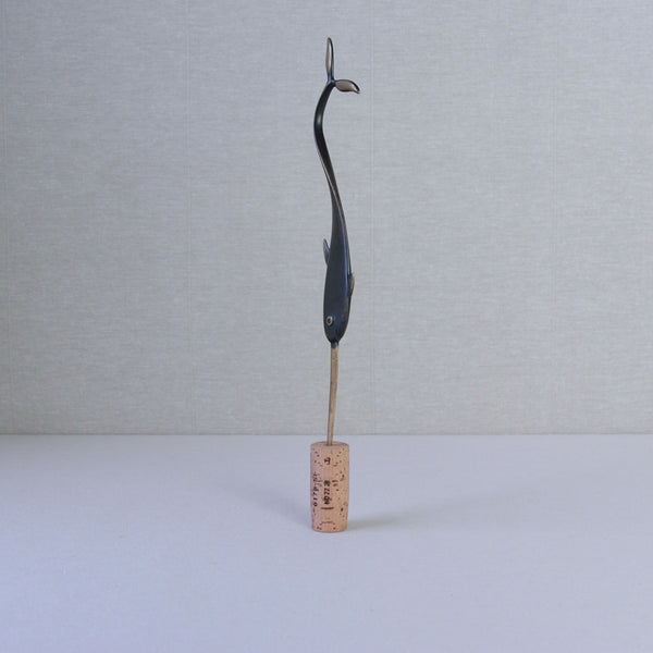 Midcentury narwhal sculpture letter opener by Richard Rohac. A collectible brass piece with sleek, modern appeal.