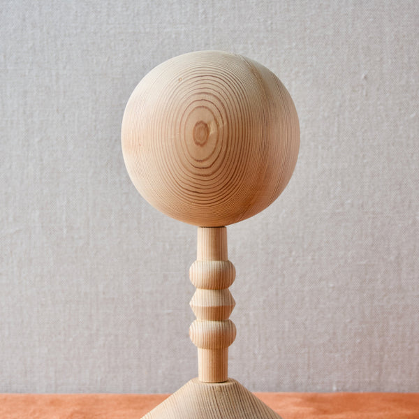 A carved spherical hat stand by Nanny Still for Norrmark, Finland