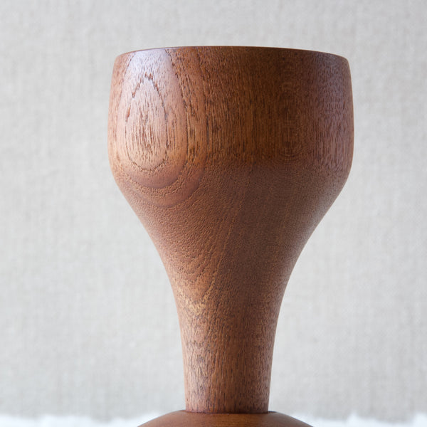 Close up of a solid teak Danish pepper mill designed by J H Quistgaard for Dansk Designs the company he founded with Martha and Ted Nierenberg in 1954. 