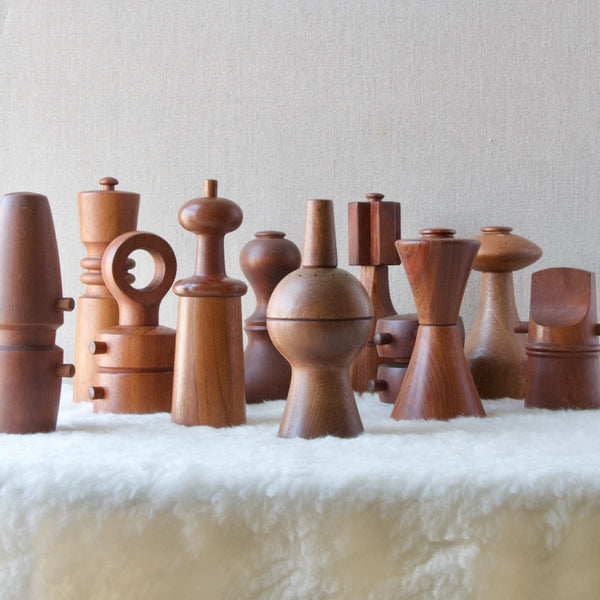 A group of Jens Quistgaard pepper mills produced by Dansk Designs from the 1950s until the 1970s. All hand carved in teak by skilled craftspeople in Denmark.