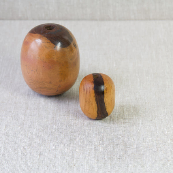 Aerial shot showing two organically round egg shaped bobbins that make great Modernist sculptures.