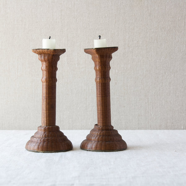 An impressive pair of Georgian pewter candlesticks wrapped in tiny woven rattan cane. Unusual home built item made by skilled craftsperson.