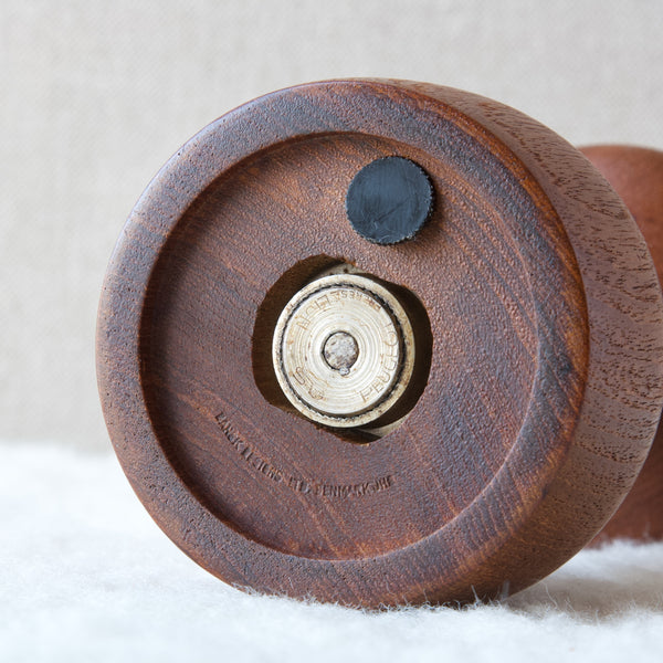 Close up showing the metal grinder on early Dansk Design pepper mill designed by Jens Quistgaard, grinding mechanism stamped Peugeot France Lion.