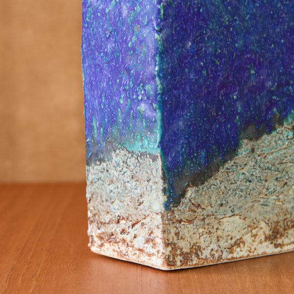 Close up of the edge of a bottle vase or pullo maljakko by Annikki Hovisaari. The image shows the rich cobalt blue glaze transitioning to turquoise blue. Hovisaari was a master of glazes in the Arabia Art Department Scandinavian's largest ceramics manufacturer.