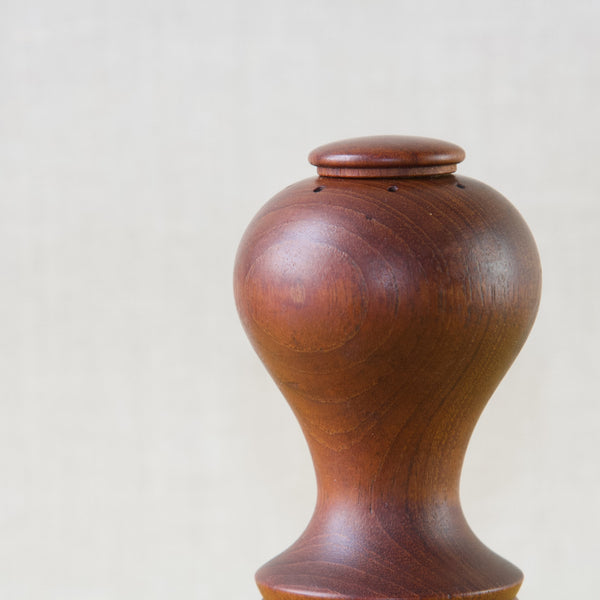 Detail showing the top of a curved hourglass pepper mill by Jens Quistgaard. Quistgaard trained as a sculptor but learnt wood carving at an early age.