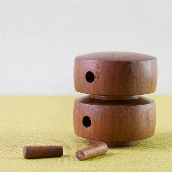 Jens Quistgaard vintage teak pepper mill in the shape of a drum or barrel, with removed teak pegs to insert salt or pepper