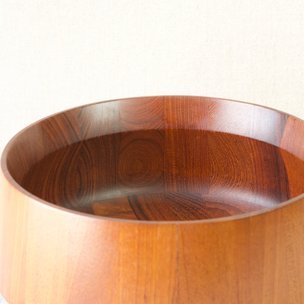 Interesting wood grain on an elegant modernist staved teak wooden fruit bowl or salad serving bowl designed by Jens Quistgaard IHQ Dansk Designs