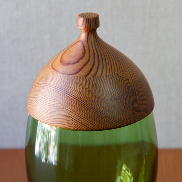 detail shot of pine wooden lid on a vintage Erik Hoglund 1960s jar