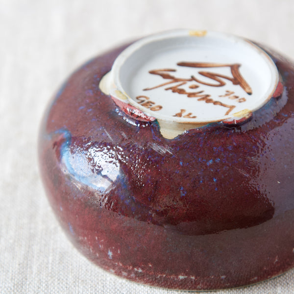 Detail showing the depth of an experimental deep-red Sang de boeuf ox-blood glaze on a unique Carl Harry Stalhane bowl, Sweden circa 1975.