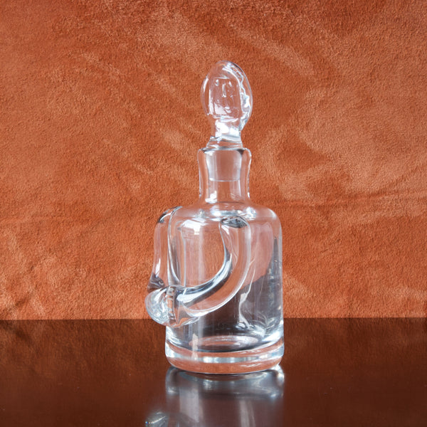 Vintage clear glass decanter in the form of a person designed in 1955 by modernist designer Erik Hoglund for Boda glassworks in Smaland, Sweden