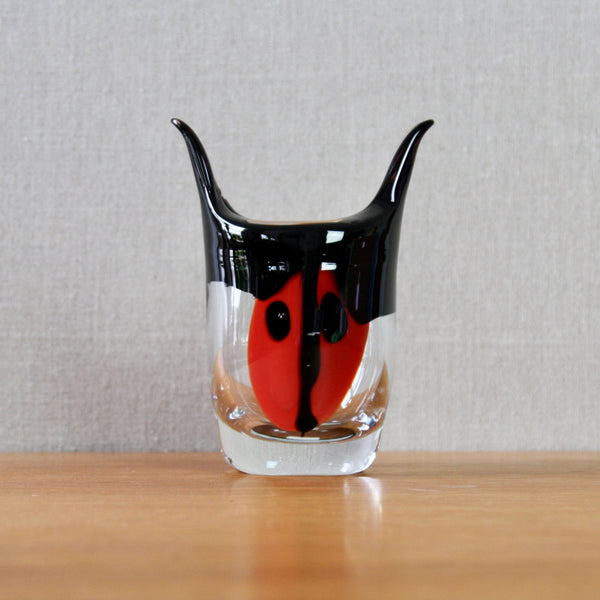 Postmodern red glass Erik Hoglund Tjur vase with face 1991