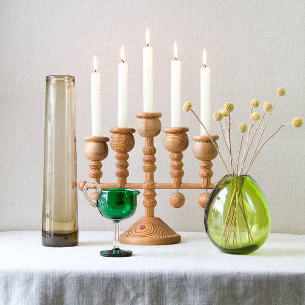 A group of Modernist Scandinavian Design objects, including Nanny Still pine candelabra and Harlekiini Riihimaki creamer, Per Lutken Holmegaard green bubble vase 