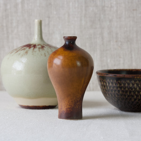 A group of mid-century modernist Scandinavian ceramics including Annikki Hovisaari vase, Rolf Palm vase, and unique Stig Lindberg bowl