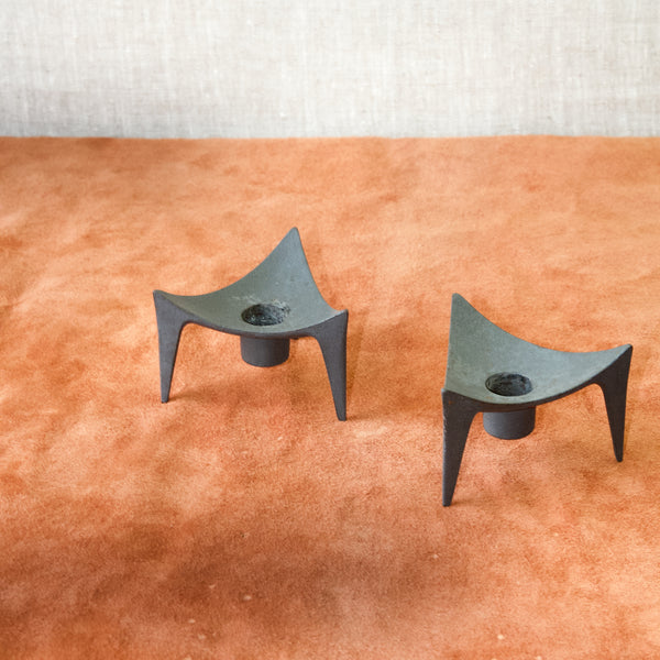 Tripod triangular cast iron metal candle holderrs by Jens Quistgaard for Dansk Designs Denmark 1960s