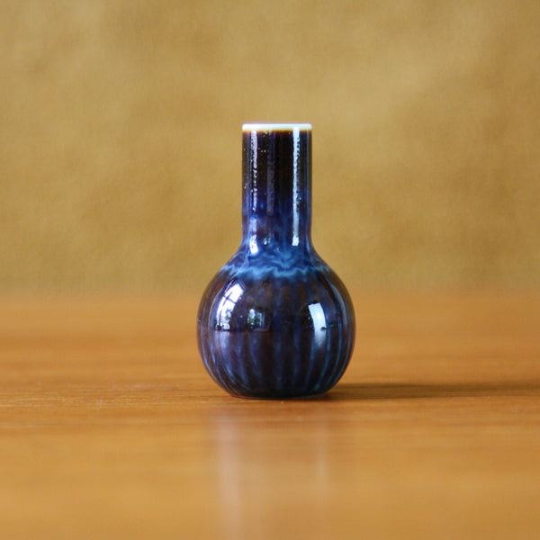 A miniature glossy brown Rorstrand vase by Carl Harry Stalhane