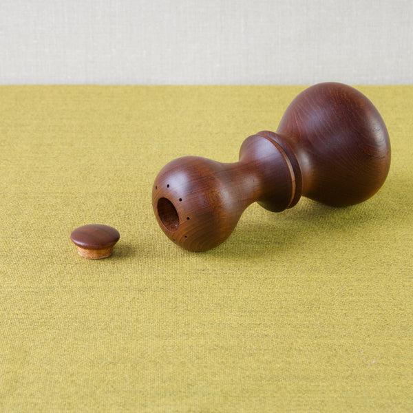 A shapely Jens Quistgaard pepper mill. This design is most commonly refereed to as the Hourglass with Double Lip. It is perhaps the design that was in production for the longest period of time.