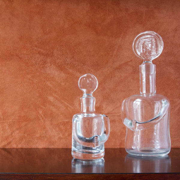 Pair of iconic modernist people decanters designed by Erik Hoglund for Boda, Sweden. Made from clear lead crystal glass 