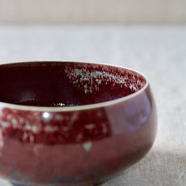 A thin hand turned white porcelain bowl made by Carl Harry Stalhane the walls of this highly decorative and richly glazed unique piece have buckled organically in the kiln.