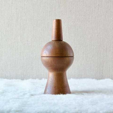 A large spherical shaped pepper mill designed by Jens Quistgaard, a rare early design produced by Dansk Design, Denmark.