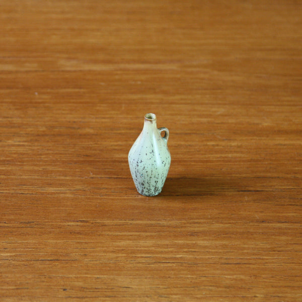 Miniature vase by Carl Harry Stalhane with handle and olive green hares fur glaze