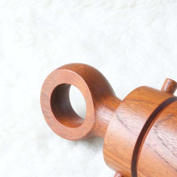 Teak Danish pepper mill by Jens Harald Quistgaard showing large hole or eyelet