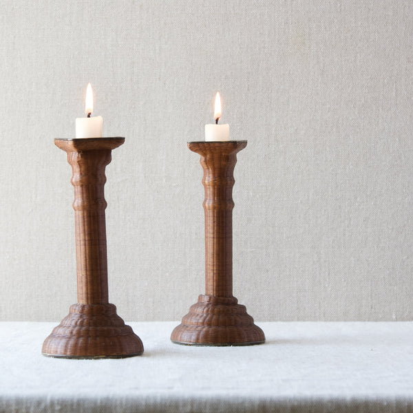 A pair of neoclassical Georgian candlesticks overlayed with tiny woven wicker. Fantastic example of social history. The objects show what craftspeople did in their evenings.