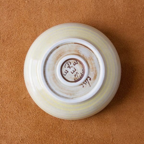 Underside of Olle Alberius bowl showing incised Rorstrand mark with signature