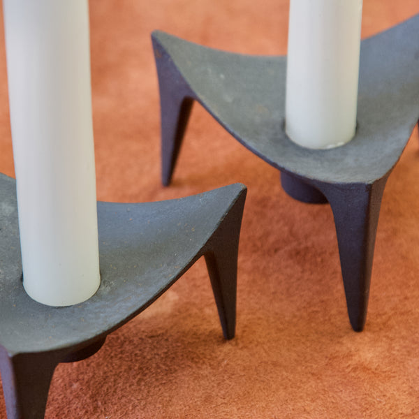 Detail of Jens Quistgaard vintage brutalist cast iron 'Tripod' triangular candle holders IHQ