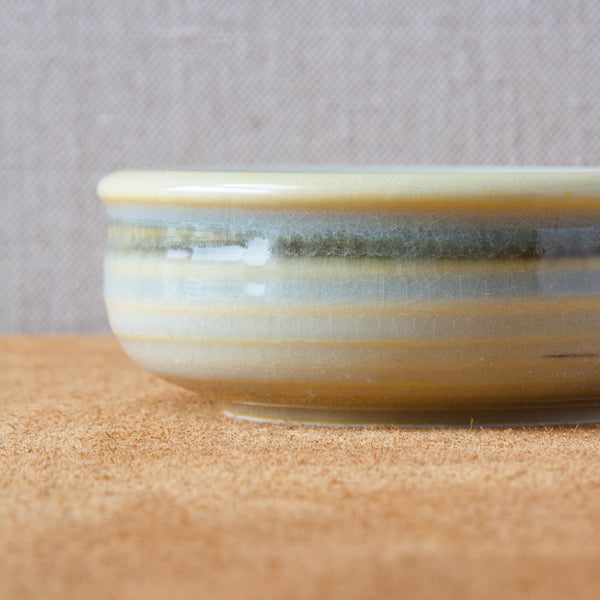 Detail of yellow and green glaze on 1960s Rorstrand bowl designed by Olle Alberius